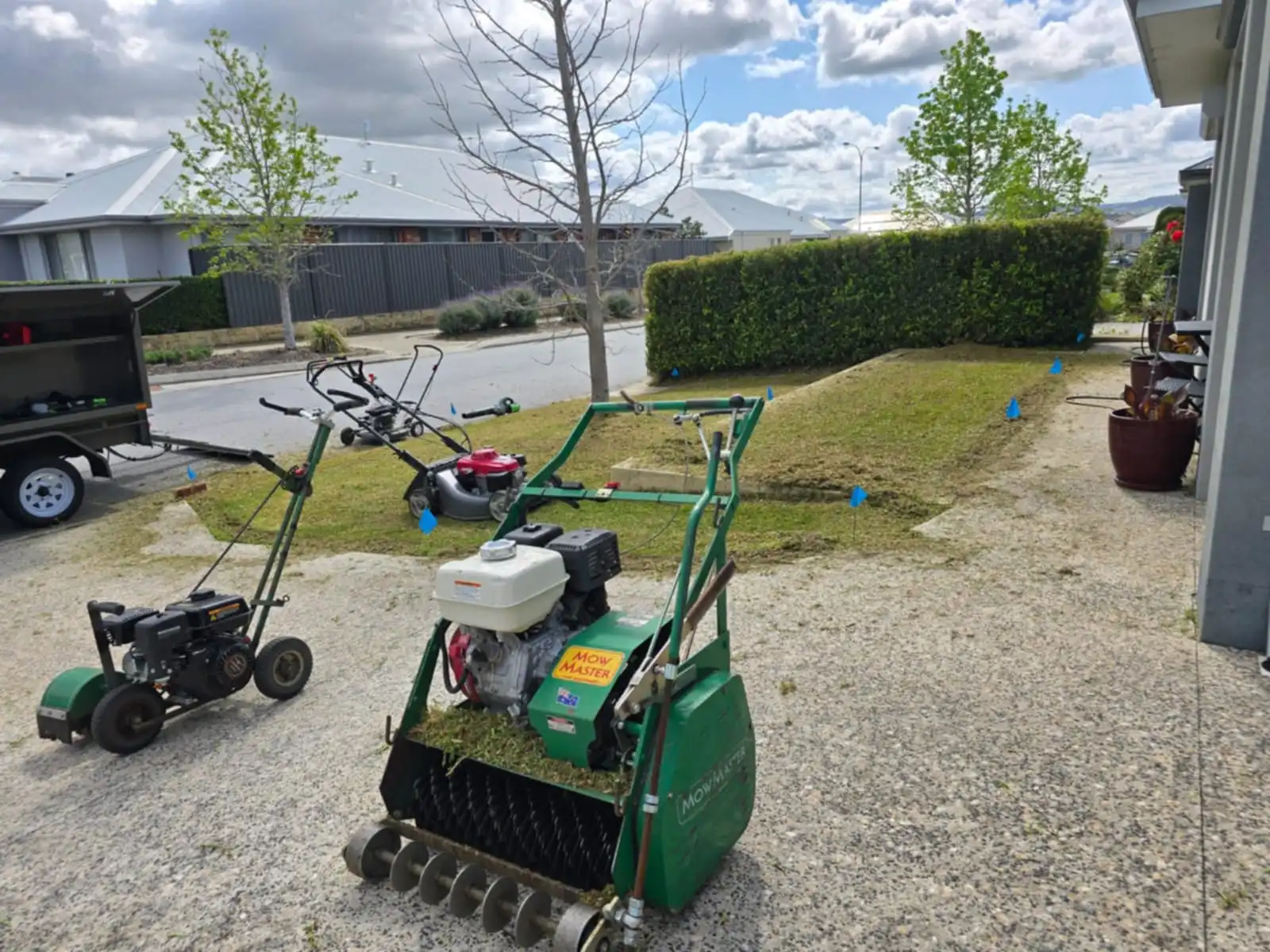 Healthy, aerated lawn maintained by Aveley Lawn Maintenance.